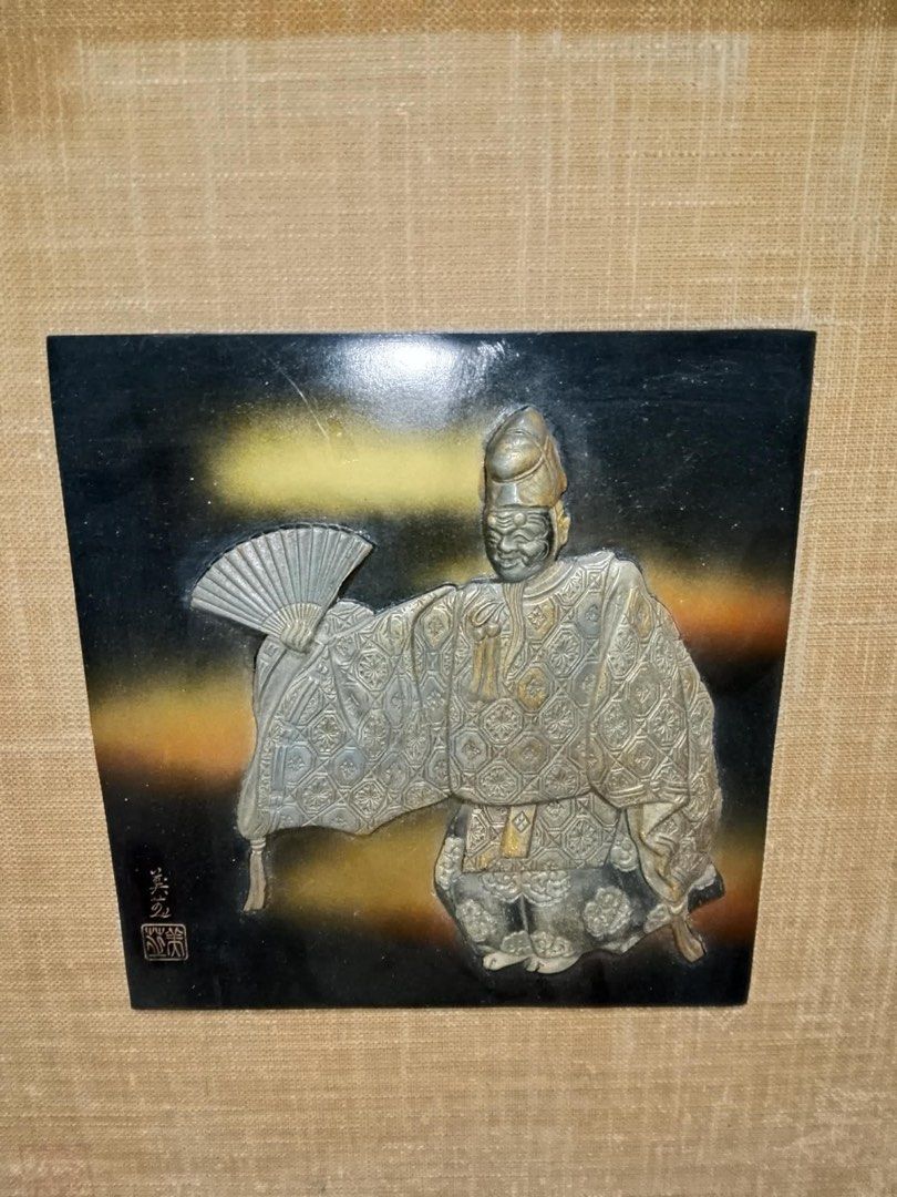 Japanese mixed-metals sculpture (Category: Vintage Collectibles) located in Santo Tomas. Submitted by retrotastic (Listing ID 1436779900, Image 1). Description: Japanese mixed-metals sculpture depicting a Noh or Kabuki actor, often identified as the character Okina.Materials & Style: These decorative art pieces typically feature silver and gold-toned metals applied to a dark metal base, creating a relief effect.Subject: The figure is often depict
