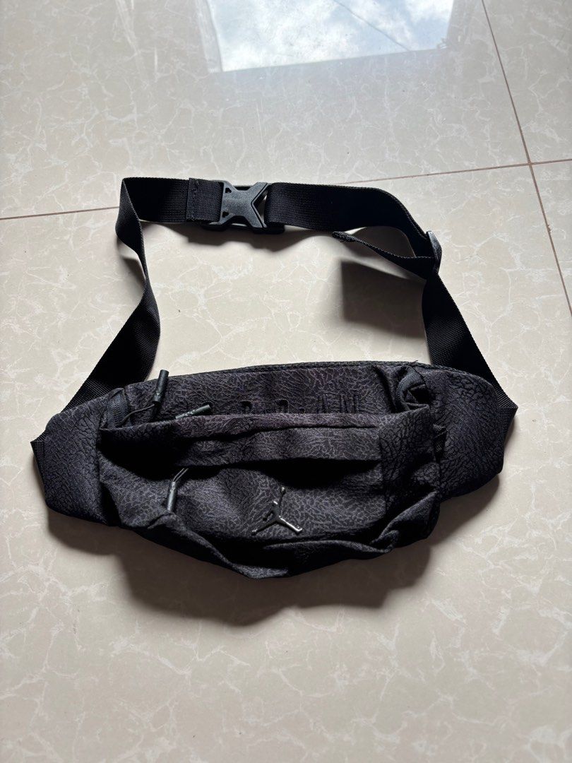 Jordan Elephant Print Waist Bag (Category: Belt bags, Clutches and Pouches) located in Quezon City. Submitted by nojthrift (Listing ID 1436760564, Image 2). Description: - Black Jordan waist bag - Elephant print design - Main compartment - Front zippered pocket - Jordan logo on front - Adjustable strap with buckle - Durable, textured material 650+ship only.