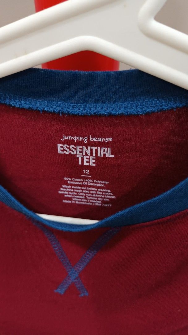 Jumping Beans Essential Tee Size 12 (Category: Babies & Kids Fashion) located in Quezon City. Submitted by ddgapstore (Listing ID 1436718574, Image 2). Description: - Jumping Beans Essential Tee - Size 12 - Color: Maroon body with blue sleeves and neckline - Crew neck Long sleeves.