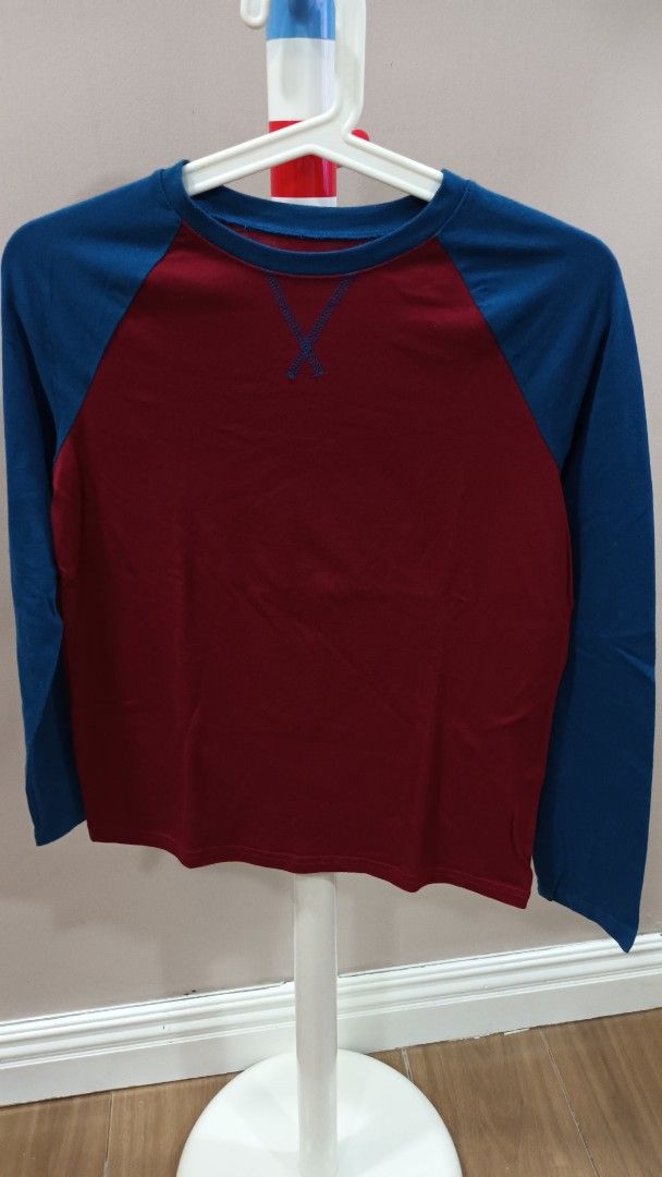 Jumping Beans Essential Tee Size 12 (Category: Babies & Kids Fashion) located in Quezon City. Submitted by ddgapstore (Listing ID 1436718574, Image 1). Description: - Jumping Beans Essential Tee - Size 12 - Color: Maroon body with blue sleeves and neckline - Crew neck Long sleeves.