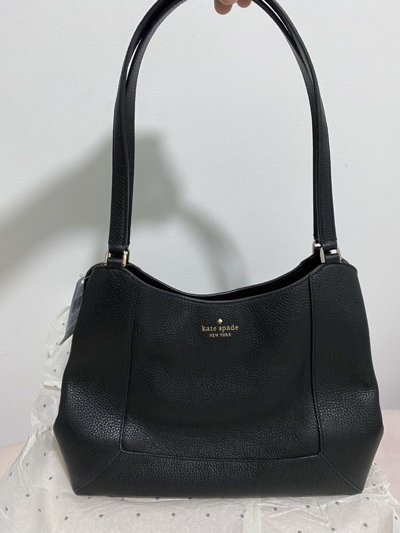 KATE SPADE Lena Pebbled Leather Handbag (Category: Luxury Bags & Wallets) located in Quezon City. Submitted by wearhouze (Listing ID 1436658035, Image 1). Description: - Authentic Kate Spade Lena handbag. - Classic black pebbled leather. - Features a gold-tone Kate Spade logo. - Secure top zipper and magnetic snap closure. - Comparable value: USD $449.00..