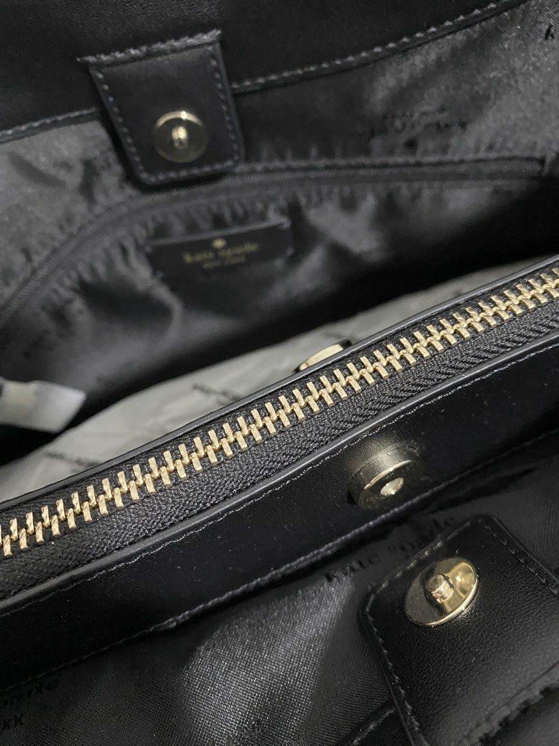 KATE SPADE Lena Pebbled Leather Handbag (Category: Luxury Bags & Wallets) located in Quezon City. Submitted by wearhouze (Listing ID 1436658035, Image 3). Description: - Authentic Kate Spade Lena handbag. - Classic black pebbled leather. - Features a gold-tone Kate Spade logo. - Secure top zipper and magnetic snap closure. - Comparable value: USD $449.00..