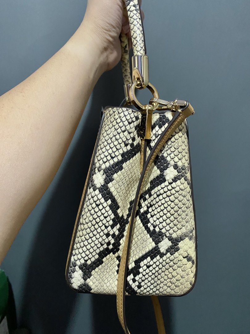 Kate Spade Phoebe Snake Skin (Category: Luxury Bags & Wallets) located in Batangas. Submitted by bagstolove3.0 (Listing ID 1436820915, Image 3). Description: - Authentic Kate Spade handbag - Tan leather body with snakeskin accents - Top handle and detachable shoulder strap - Gold-tone clasp closure and hardware - Original price tag included.