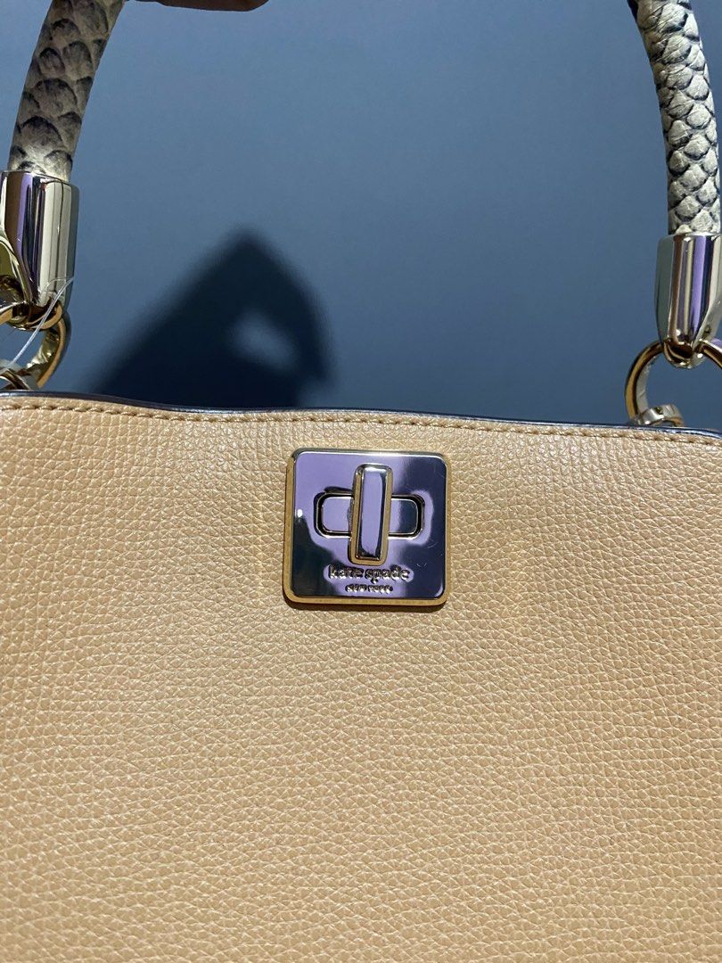 Kate Spade Phoebe Snake Skin (Category: Luxury Bags & Wallets) located in Batangas. Submitted by bagstolove3.0 (Listing ID 1436820915, Image 2). Description: - Authentic Kate Spade handbag - Tan leather body with snakeskin accents - Top handle and detachable shoulder strap - Gold-tone clasp closure and hardware - Original price tag included.