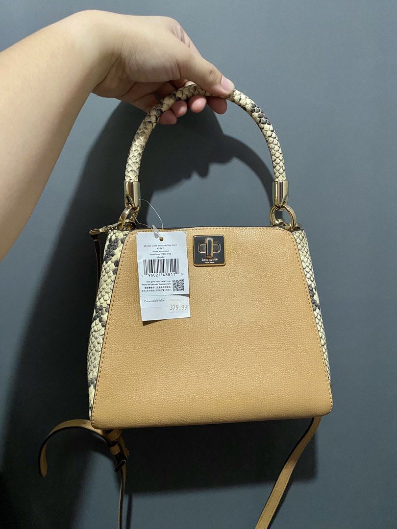 Kate Spade Phoebe Snake Skin (Category: Luxury Bags & Wallets) located in Batangas. Submitted by bagstolove3.0 (Listing ID 1436820915, Image 1). Description: - Authentic Kate Spade handbag - Tan leather body with snakeskin accents - Top handle and detachable shoulder strap - Gold-tone clasp closure and hardware - Original price tag included.