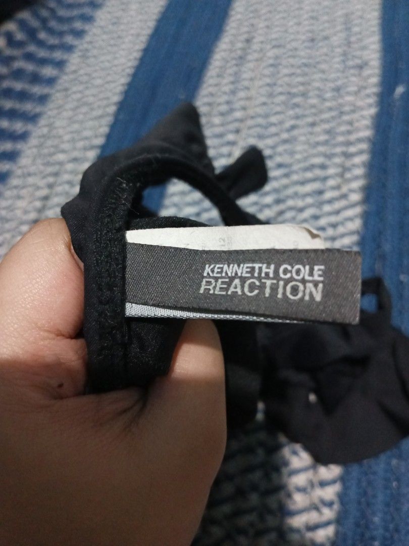 Kenneth Cole Reaction One Piece Black (Category: Bikinis & Swimsuits) located in Manila. Submitted by justonemor27277 (Listing ID 1436772218, Image 3). Description: never used padala very stretchy fabric and smooth on the skin sexy and classy.