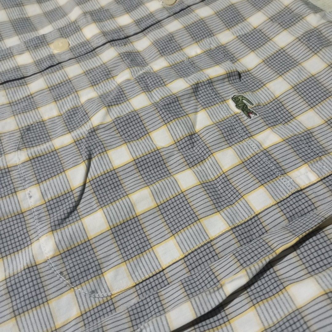 Lacoste Checkered Long Sleeve Shirt (Category: Tshirts & Polo Shirts ) located in Manila. Submitted by johnpaulnoga29 (Listing ID 1436696215, Image 2). Description: - Lacoste long sleeve shirt - Checkered pattern - Button-down style - Features chest pocket with Lacoste logo - Collar size: 39 - Classic fit - Ideal for casual occasions.