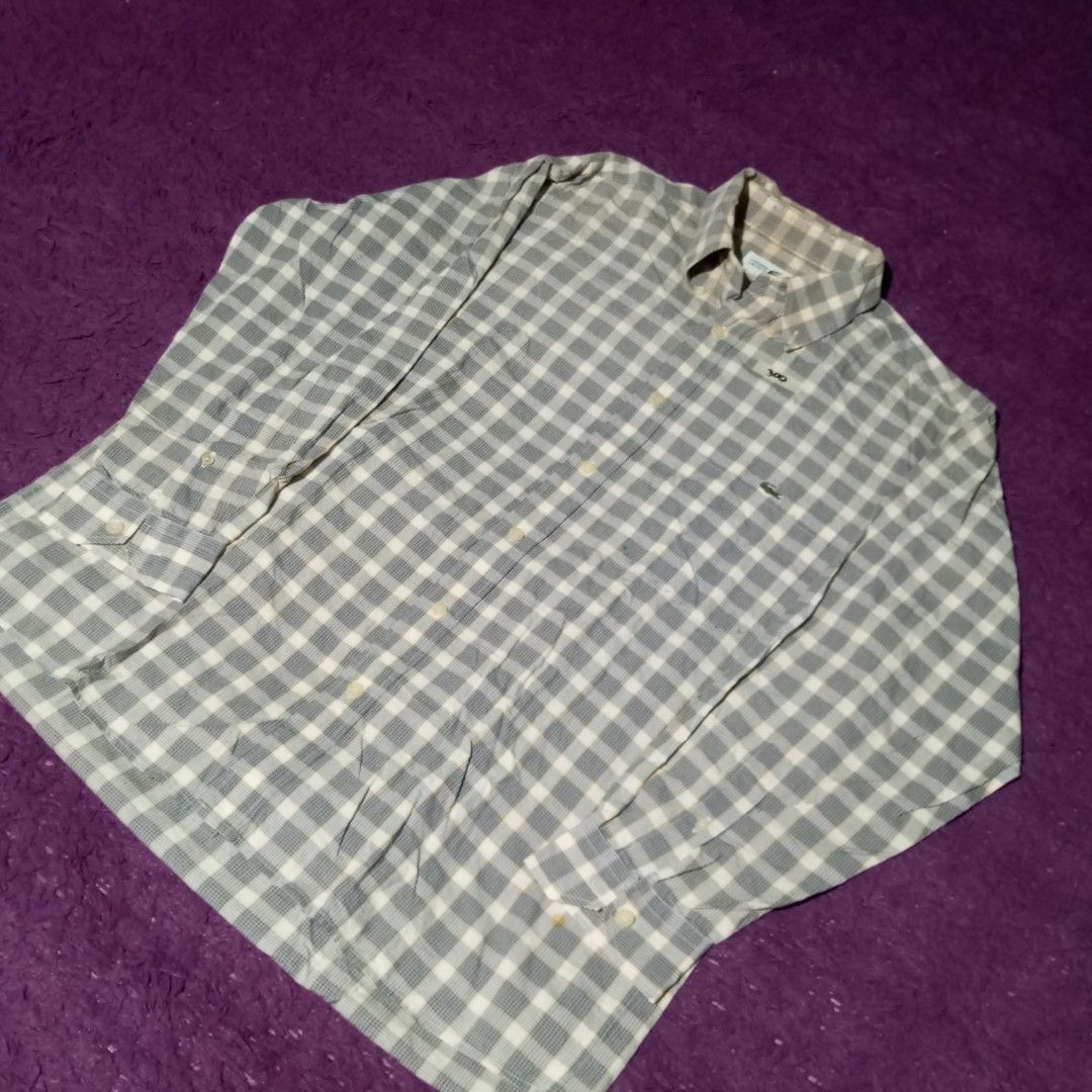 Lacoste Checkered Long Sleeve Shirt (Category: Tshirts & Polo Shirts ) located in Manila. Submitted by johnpaulnoga29 (Listing ID 1436696215, Image 1). Description: - Lacoste long sleeve shirt - Checkered pattern - Button-down style - Features chest pocket with Lacoste logo - Collar size: 39 - Classic fit - Ideal for casual occasions.
