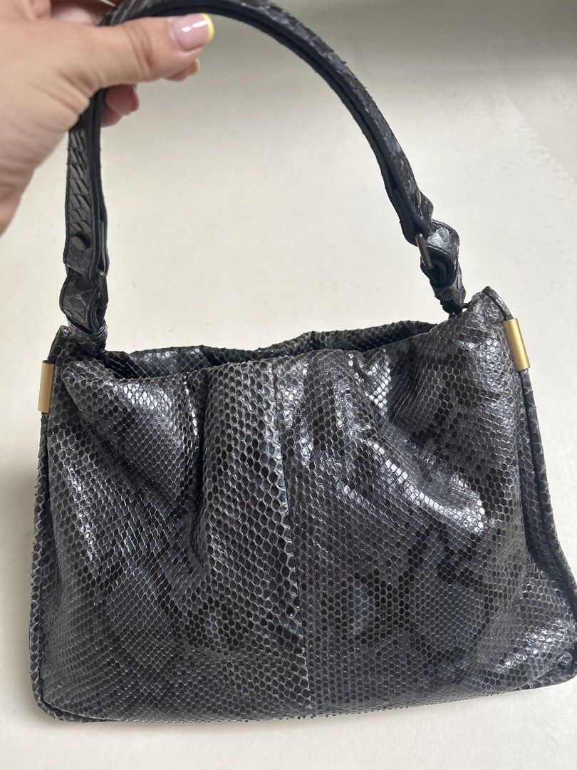 Lanvin Python Leather Handbag (Category: Bags & Wallets) located in Singapore. Submitted by supersizedlife (Listing ID 1436653458, Image 2). Description: - Authentic Lanvin handbag - Genuine python leather - Top handle and detachable chain strap - Made in Italy - Minimal wear, clean interior - Stylish and unique.