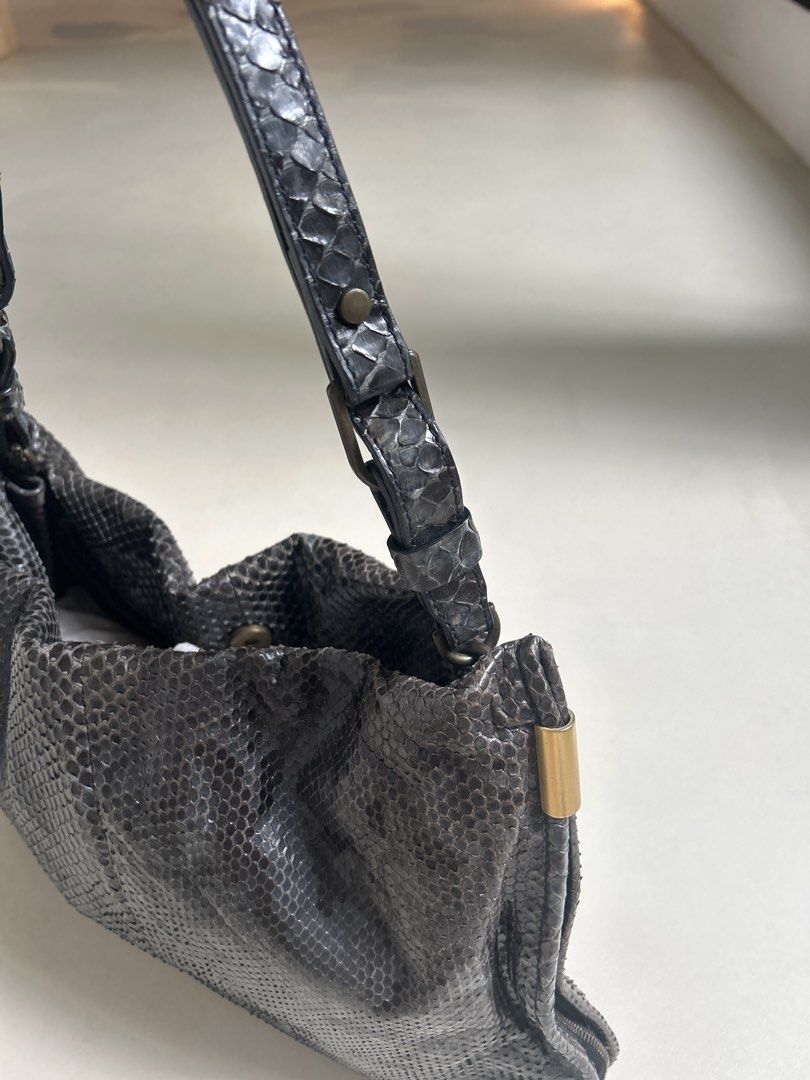 Lanvin Python Leather Handbag (Category: Bags & Wallets) located in Singapore. Submitted by supersizedlife (Listing ID 1436653458, Image 3). Description: - Authentic Lanvin handbag - Genuine python leather - Top handle and detachable chain strap - Made in Italy - Minimal wear, clean interior - Stylish and unique.