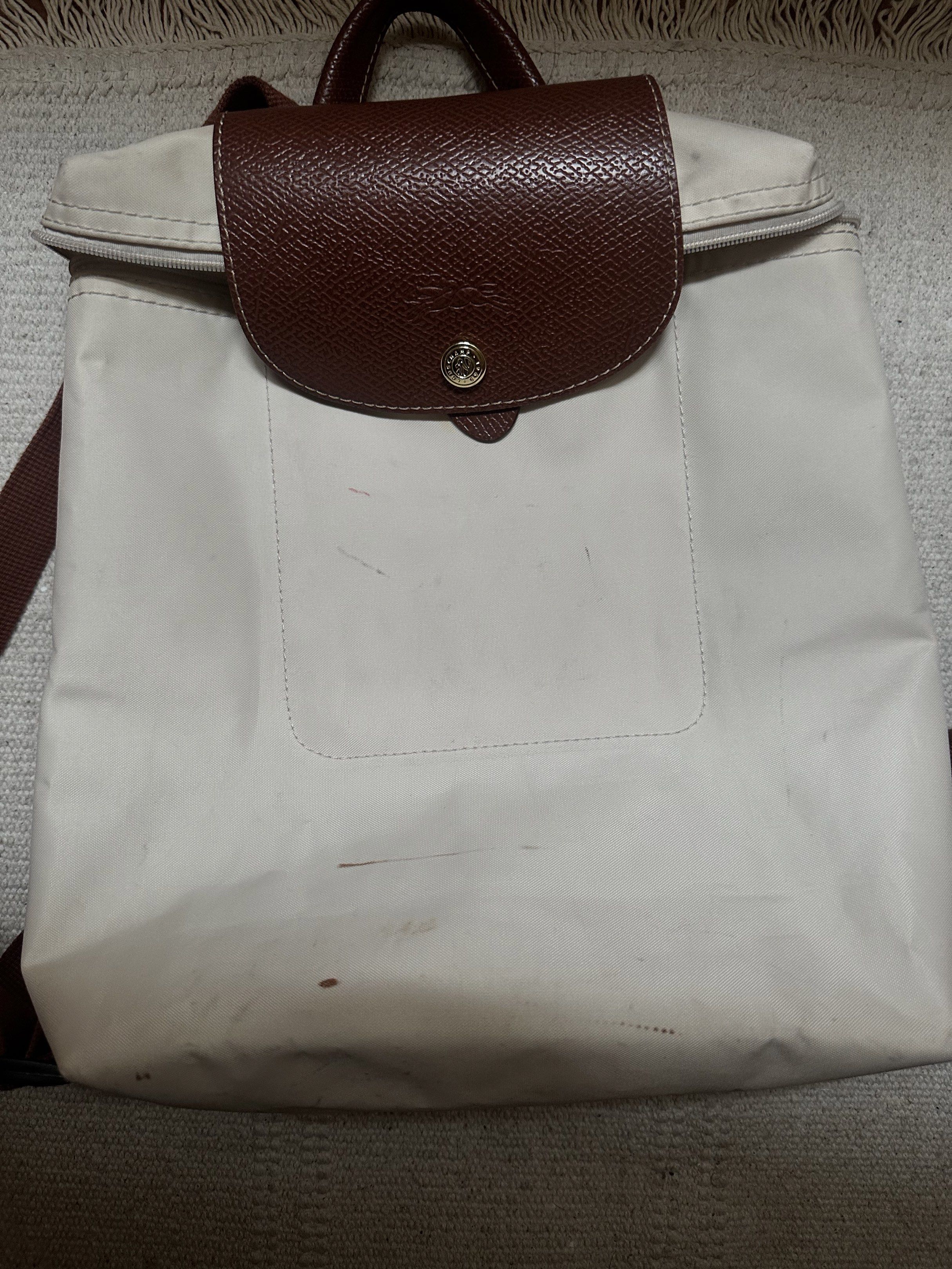 Longchamp backpack (Category: Backpacks) located in Imus. Submitted by stufftodeclutter (Listing ID 1436664217, Image 2). Description: Needs washing! Otherwise the bag is oki pa for use..