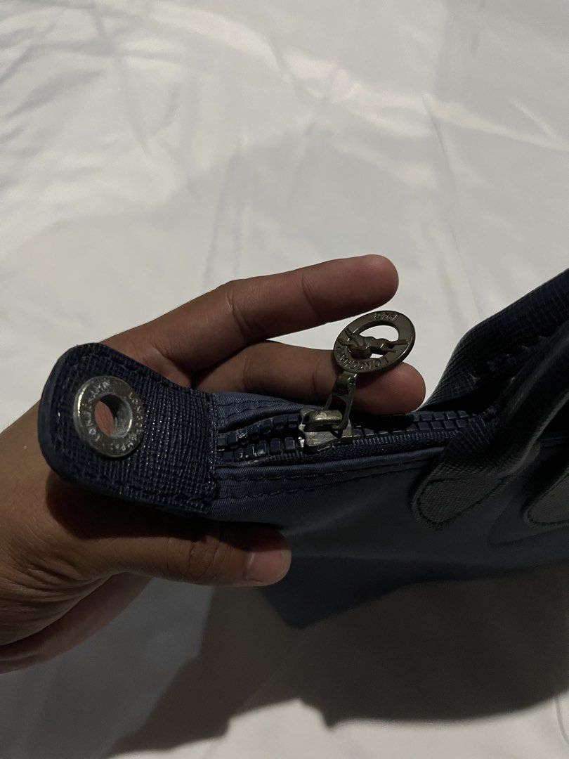 Longchamp Modele Depose Mini (Category: Luxury Bags & Wallets) located in Adams. Submitted by princess.maggie (Listing ID 1436769010, Image 3). Description: - lightly used - missing sling - sign of usage only.
