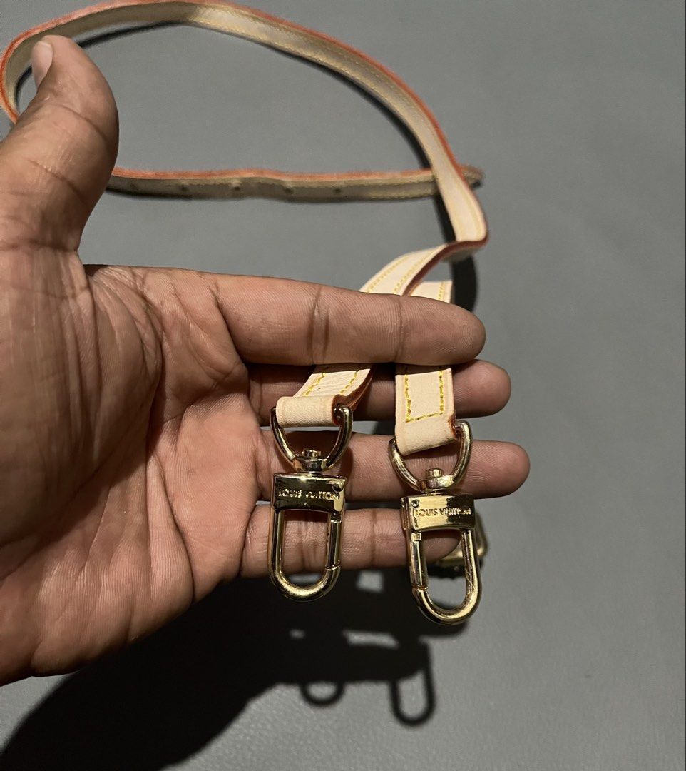 Louis Vuitton Bag Strap (Category: Luxury Bags & Wallets) located in General Santos City (Dadiangas). Submitted by thiftnibadi3 (Listing ID 1436786031, Image 2). Description: - Louis Vuitton bag strap set - Includes two straps: long and short - Cream-colored leather - Yellow stitching - Gold-tone hardware - Features the Louis Vuitton logo - Perfect for replacement or added versatility.