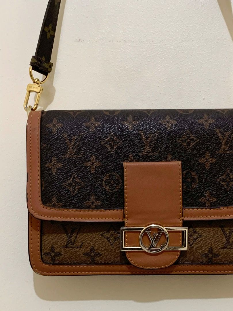 Louis Vuitton Dauphine sling bag in Monogram Reverse (Category: Luxury Bags & Wallets) located in Valenzuela. Submitted by choi_0711 (Listing ID 1436713482, Image 3). Description: - with leather stamp Louis Vuitton shoulder bag - Iconic Monogram pattern - Brown leather flap - Silver-tone buckle closure - Detachable monogram strap - Gold-tone hardware With minor rubs on the rubber lining but not very visible.