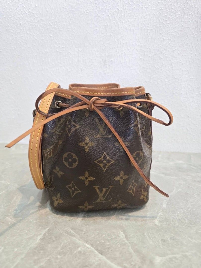 Louis Vuitton Nano Noe Bucket Bag Authentic💯💯 (Category: Cross-body Bags) located in Davao. Submitted by SecondhandItems97 (Listing ID 1436717896, Image 2). Description: Rare to find this Louis Vuitton Nano Monogram Bucket Bag Includes original Louis Vuitton dustbag Mini size.