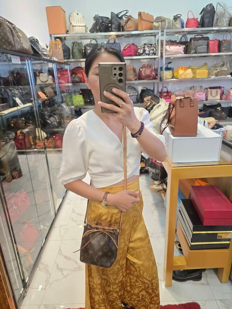 Louis Vuitton Nano Noe Bucket Bag Authentic💯💯 (Category: Cross-body Bags) located in Davao. Submitted by SecondhandItems97 (Listing ID 1436717896, Image 3). Description: Rare to find this Louis Vuitton Nano Monogram Bucket Bag Includes original Louis Vuitton dustbag Mini size.
