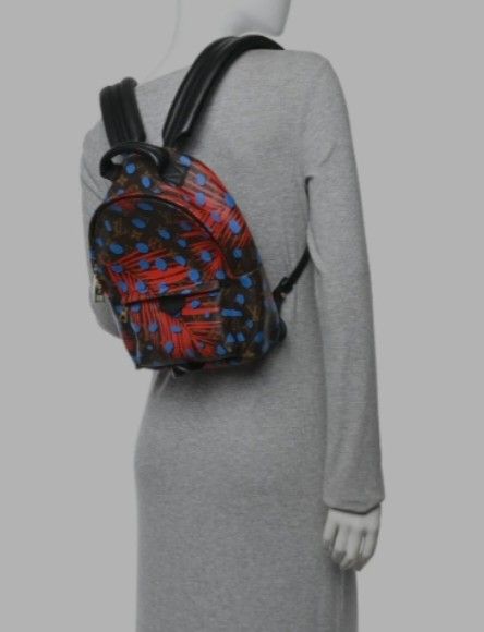 LV Palm Springs Canvas Leather Small Backpack (Category: Luxury Bags & Wallets) located in Navotas City. Submitted by riyuwi (Listing ID 1436748118, Image 2). Description: PreOwned Lightly Used LV Monogram Palm Springs Canvas leather backpack. Small-Medium - Eye-catching pattern with red and blue accents. - Classic brown background. - Comfortable top handle and adjustable shoulder straps. - Interior with black lining and a pocket. - Stylish gold-