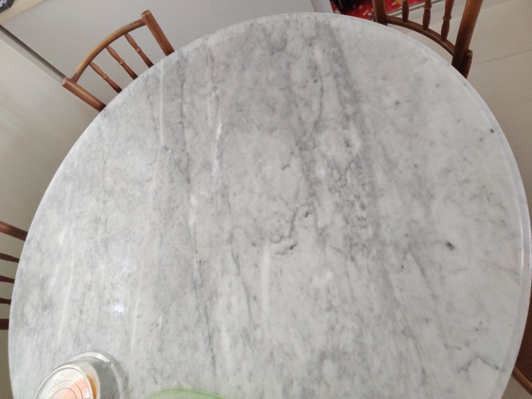 Marble dining table (Category: Tables & Sets) located in Singapore. Submitted by rizuki9283 (Listing ID 1436705686, Image 2). Description: Height 30cm Diameter 55cm approximately Chairs 15 each 6 chairs altogether.