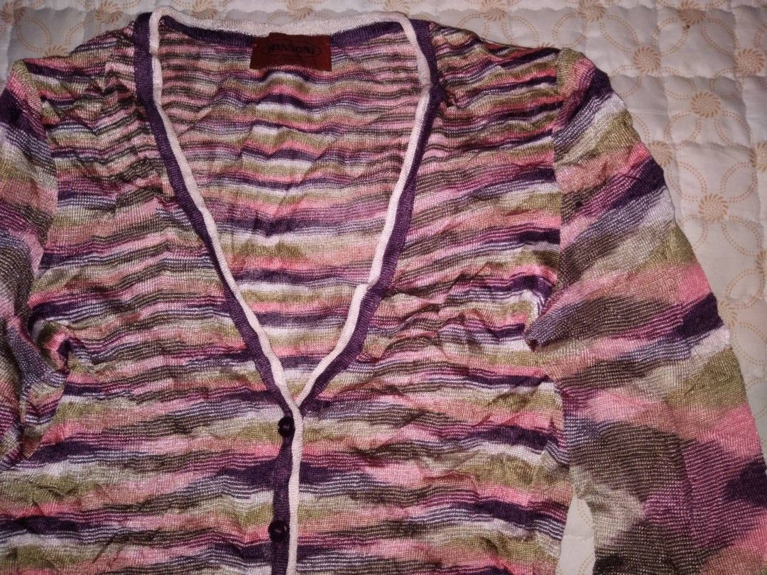 Missoni Striped Knit Cardigan (Category: Coats, Jackets and Outerwear) located in Zamboanga. Submitted by nurbya898048 (Listing ID 1436822450, Image 2). Description: - Authentic Missoni cardigan - Size: 38/medium - Features a vibrant striped pattern (pink, purple, green) - Made in Italy - Design: V-neckline, button closure - Fabric: Knit material - Condition excellent - Color rate 9.8/10 - Presentable, no flaws - See all photos for details 750+sh