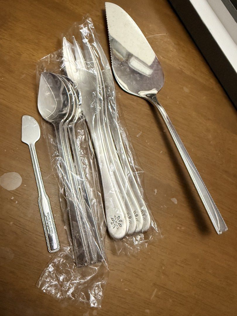 mix bran 10/10 Flatware Set (Category: Dinnerware & Cutlery) located in Pilar. Submitted by faveanyshop (Listing ID 1436732310, Image 1). Description: - Complete flatware set with cake server, forks, spoons, and butter knife. - Features a beautiful floral design on forks and spoons. - Marked '10/10' on handles. - Ideal for serving desserts and appetizers. - Includes original box. -mix brand luckywood & sybilla.