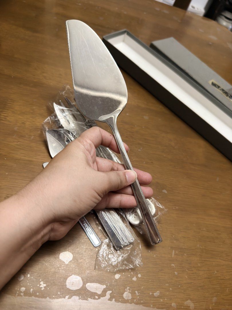 mix bran 10/10 Flatware Set (Category: Dinnerware & Cutlery) located in Pilar. Submitted by faveanyshop (Listing ID 1436732310, Image 2). Description: - Complete flatware set with cake server, forks, spoons, and butter knife. - Features a beautiful floral design on forks and spoons. - Marked '10/10' on handles. - Ideal for serving desserts and appetizers. - Includes original box. -mix brand luckywood & sybilla.