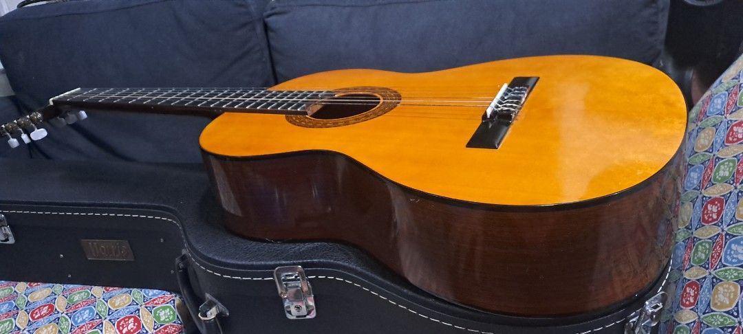 Morris MC-100 Classical Guitar with Case (Category: Musical Instruments) located in Quezon City. Submitted by chrisconradbautista (Listing ID 1436725644, Image 1). Description: Morris MC-100 Classical Guitar In very good condition Almost New, No Issue, No Scratch 100% authentic Morris from Japan With Original Morris Hard Case Made in Korea See to Appreciate Auto pass po sa swap and low ballers Guarranteed walang issue po yung gitara Shipping fee 