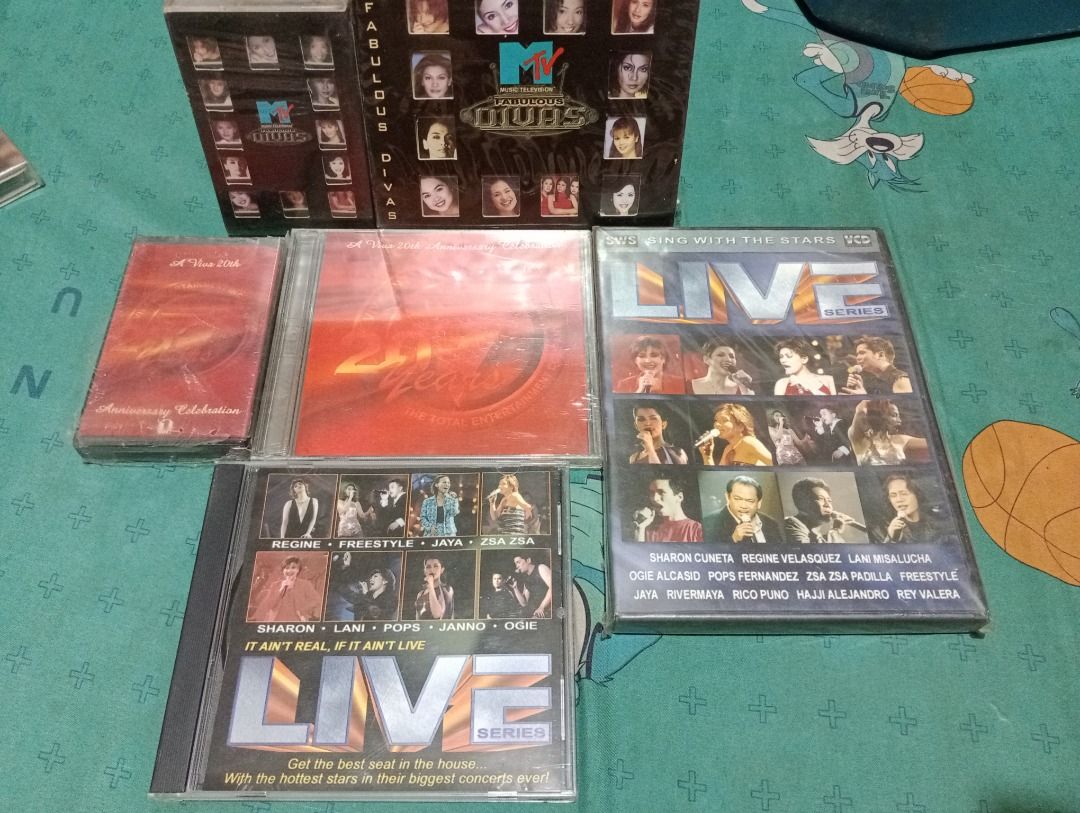MTV Divas, Live Series CDs and VCDs (Category: CDs & DVDs) located in Quezon City. Submitted by biancabam012 (Listing ID 1436664279, Image 1). Description: Take ALL for 1,100 Viva 20th Anniversary sealed Collection of music CDs and VCDs featuring various artists. Includes MTV Divas box set, anniversary celebration CD, and Live Series CDs and VCDs. Features artists like Regine, Freestylers, Jaja, Zsa Zsa, Sharon, Lani, Pops, Janno, and more. Inclu