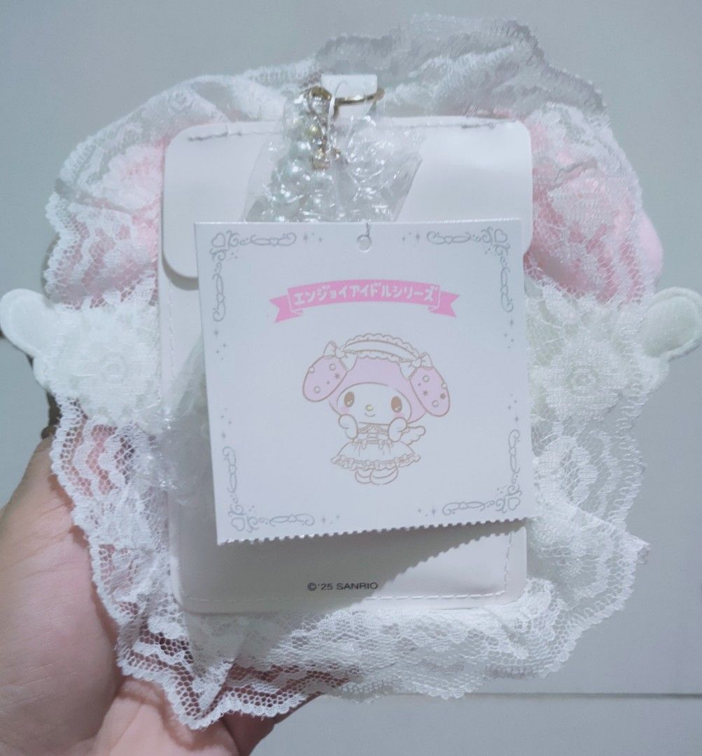 My Melody Trading Card Holder (Category: Wallets & Card holders) located in San Juan City. Submitted by raremountain_5de9b2 (Listing ID 1436769494, Image 2). Description: - Adorable My Melody trading card holder! - Features a sweet pink and white design. - Decorated with white lace trim and a bow. - Includes a charming My Melody charm. - Fits cards up to 9.2 x 6.6 cm. - Brand new with original tag!.