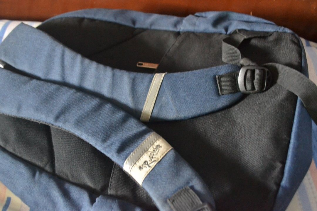 Navy Blue Backpack (Category: Backpacks) located in Valenzuela. Submitted by miss_merix (Listing ID 1436730620, Image 2). Description: - Navy blue backpack - Main compartment and front pocket - Adjustable shoulder straps - Padded back panel for comfort - Top handle for easy carrying - Zipper closure - Small brand tag.