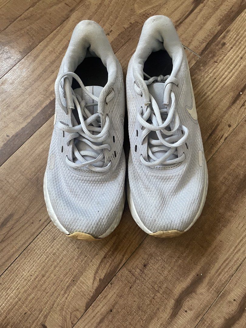 Nike Revolution Running Shoes Lilac (Category: Sneakers) located in Quezon City. Submitted by theabeatricee (Listing ID 1436738496, Image 1). Description: Price slightly negotiable .