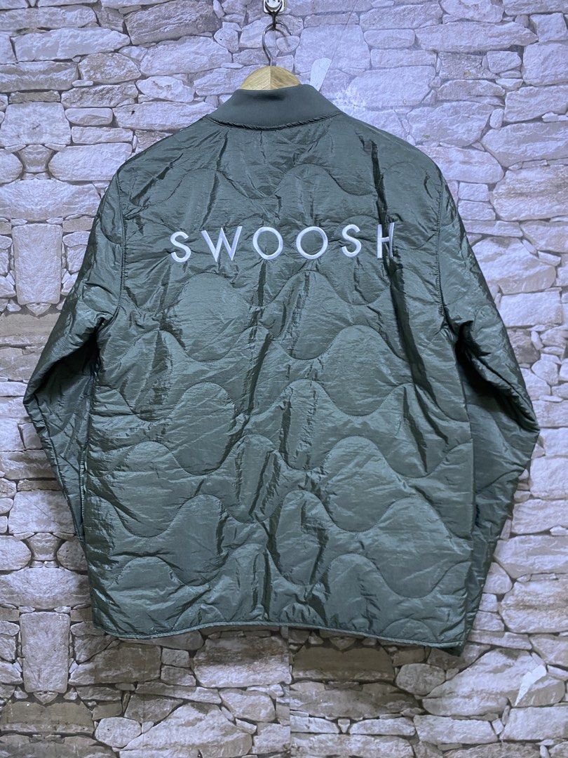 Nike Swoosh Quilted Jacket embroidered logo (Category: Coats, Jackets and Outerwear) located in Manila. Submitted by ownywest833 (Listing ID 1436777924, Image 2). Description: 9500 pesos only✅ from 15,095 SRP ❌ size XL brandnew authentic with hangtags and plastic.