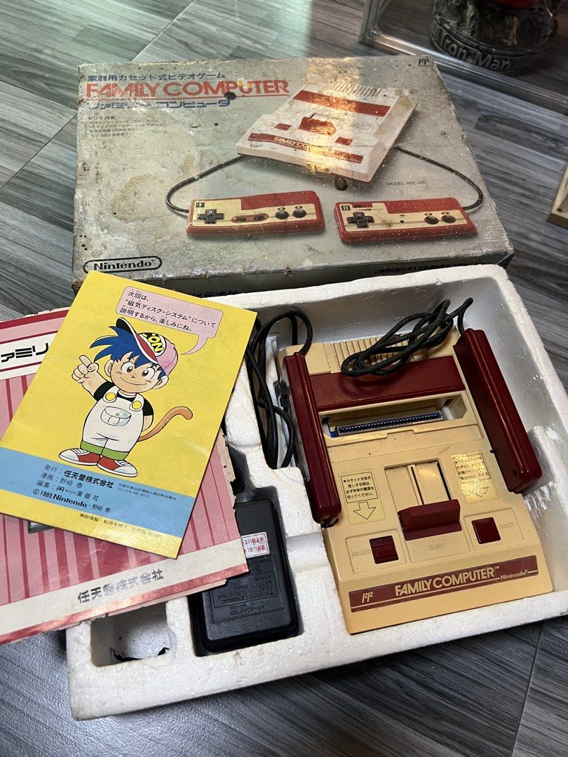 Nintendo Family Computer Console (Category: Others) located in Manila. Submitted by thegreyhousemarket (Listing ID 1436817114, Image 1). Description: - Vintage Nintendo Family Computer console - Includes: - Console - Two controllers - Power adapter - Original box - Instruction manual - Box shows some wear and tear - Great for retro gaming enthusiasts.