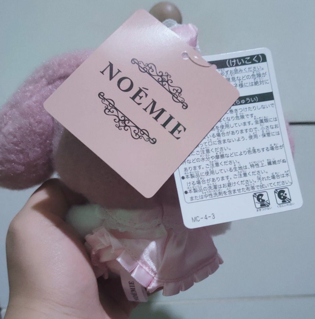 Noémie My Melody Plush Keychain (Category: Plushies & Soft Toys) located in San Juan City. Submitted by raremountain_5de9b2 (Listing ID 1436769243, Image 2). Description: - My Melody plush keychain - Pink dress and bow - Heart-shaped gem detail - Matching pink head bow - White face and feet - Includes original tags.
