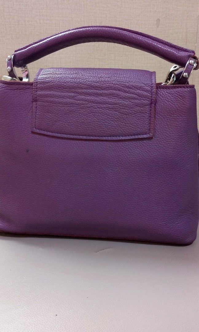 LV bag purple leather (Category: Luxury Bags & Wallets) located in Manila. Submitted by honeylei28 (Listing ID 1436703633, Image 2). Description: pa cleaning na lang po sa loob need ng bag. medyo naistock sa cabinet and may mga small scratches sa loob ng pocket and sa backel strap other than that no issues po sa labas ng bag...