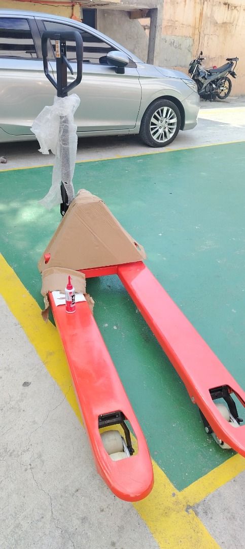 Pallet Jack Narrow Type (Category: Construction Tools & Equipment) located in Quezon City. Submitted by msochea (Listing ID 1436650981, Image 1). Description: - Red pallet jack - Sturdy construction - Easy to maneuver - Features a lifting mechanism - Smooth-rolling wheels - In good working condition - Perfect for heavy loads - Ideal for warehouses and industrial settings.