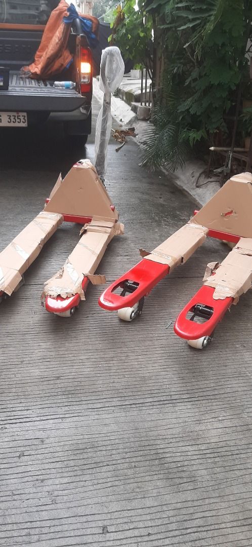 Pallet Jack Narrow Type (Category: Construction Tools & Equipment) located in Quezon City. Submitted by msochea (Listing ID 1436650981, Image 3). Description: - Red pallet jack - Sturdy construction - Easy to maneuver - Features a lifting mechanism - Smooth-rolling wheels - In good working condition - Perfect for heavy loads - Ideal for warehouses and industrial settings.