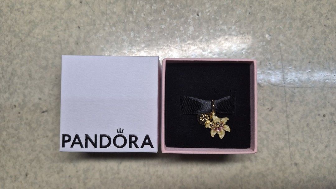 Pandora Tangled Flower glow in the dark (Category: Charms) located in Manila. Submitted by john.david.co (Listing ID 1436701027, Image 1). Description: Pandora Tangled Flower glow in the dark Never used, comes with original box, paper bag, and warranty certificate Bought in MOA branch October 2025.