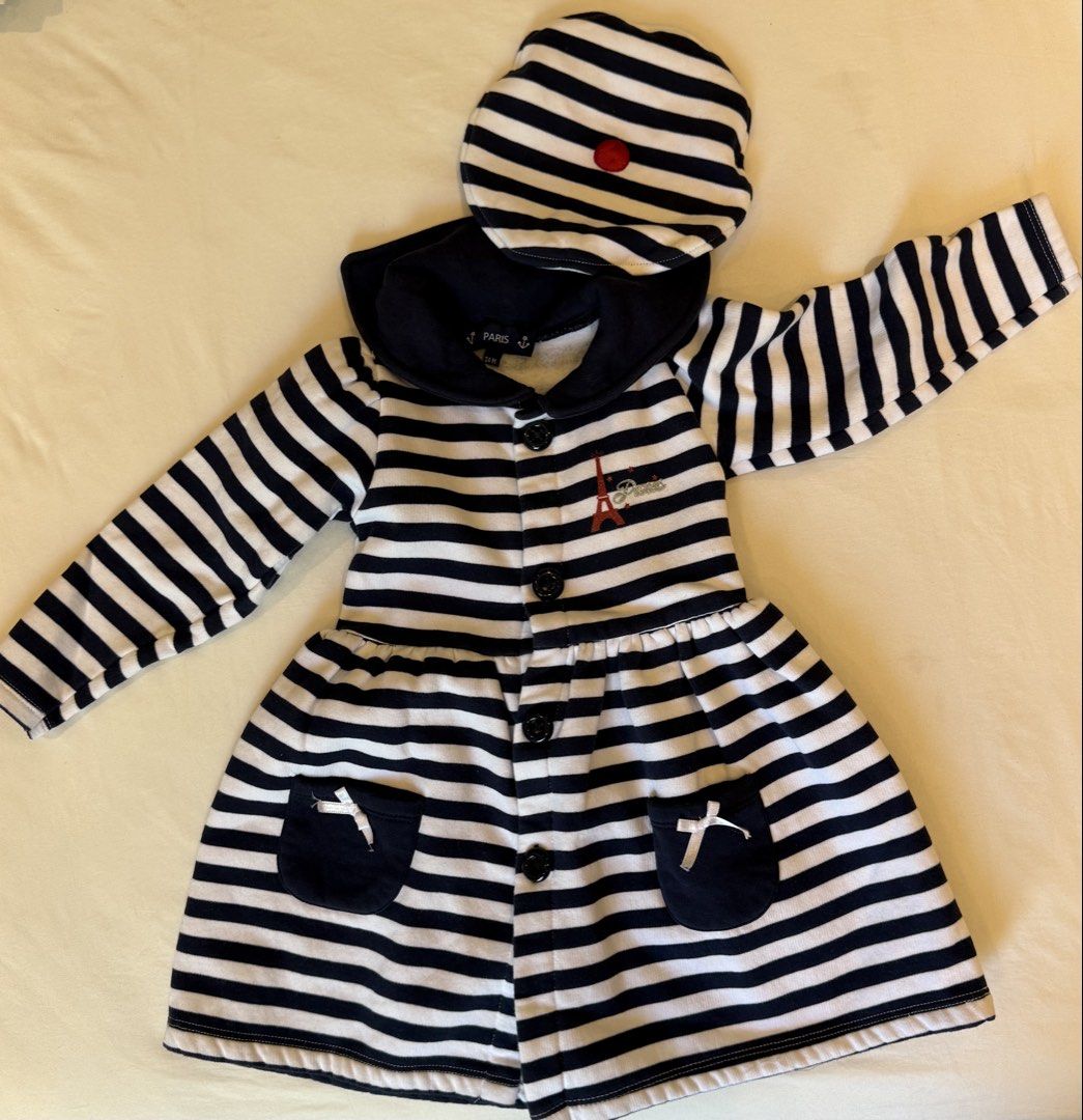 Paris Striped Dress Coat with Hat (Category: Babies & Kids Fashion) located in Manila. Submitted by littleprincesscloset (Listing ID 1436705004, Image 1). Description: - Dress coat and hat set - Navy blue and white striped design - Features a collar and pockets - Eiffel Tower design on the coat - Button closures on the coat - Matching har with red button detail Lalamove within Metro Manila c/o buyer..