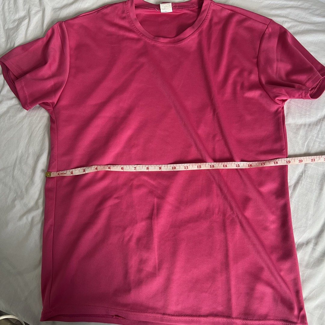 Pink Dri-fit T-shirt (Category: Activewear) located in Marikina City. Submitted by helpmedeclutter.ml (Listing ID 1436819494, Image 1). Description: - Pink crew neck t-shirt - Short sleeves - Classic round neckline - Lightweight, breathable fabric - Perfect for everyday wear - Measurements in images - Simple and versatile design Gcash Marikina area.