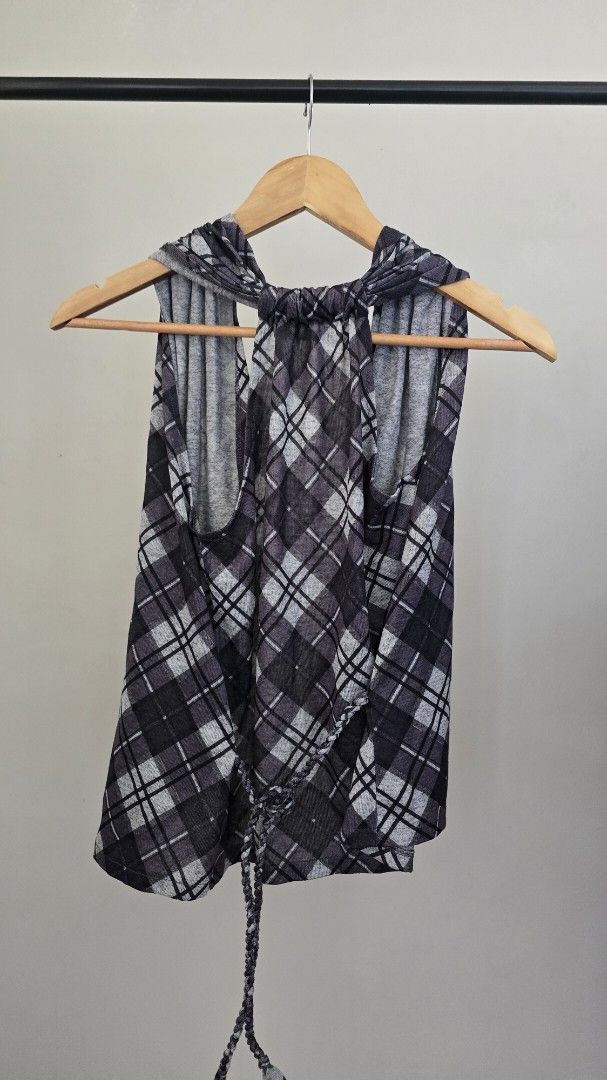 Plaid Sleeveless vest (Category: Others Tops) located in Paranaque City. Submitted by caaands (Listing ID 1436745399, Image 2). Description: - Open vest - Tie at the back - can be worn over tank top or plain shirt - Fits S-M.