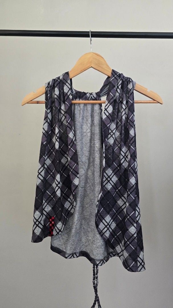 Plaid Sleeveless vest (Category: Others Tops) located in Paranaque City. Submitted by caaands (Listing ID 1436745399, Image 1). Description: - Open vest - Tie at the back - can be worn over tank top or plain shirt - Fits S-M.