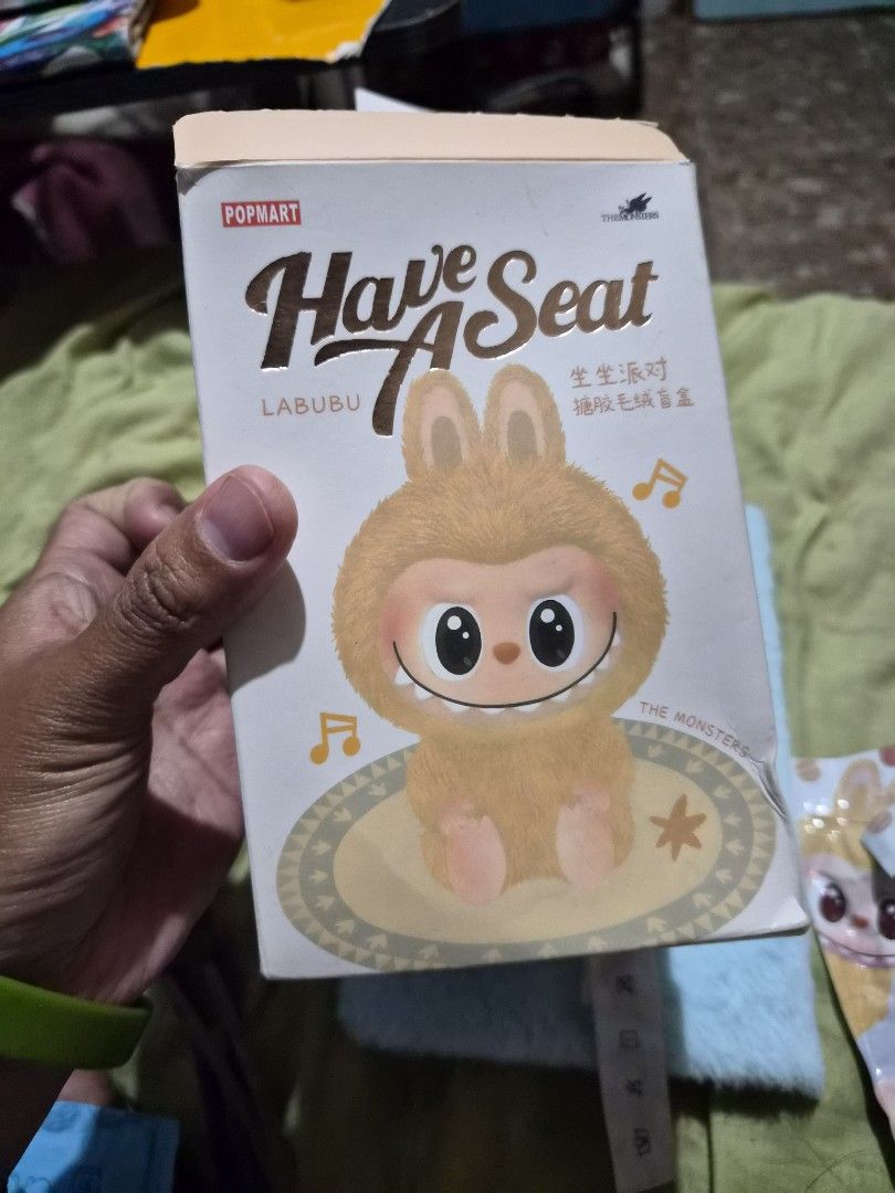 Pop Mart Labubu Have a Seat Keychain (Category: Designer & Blind Box Toys) located in Mandaue City. Submitted by chuchi152615 (Listing ID 1436751754, Image 2). Description: - Adorable Labubu keychain from Pop Mart. - Features a cute sheep design with a smiling face. - Comes with original box and packaging. - Perfect for adding a touch of fun to your bag or keys. - Made of soft, plush material..