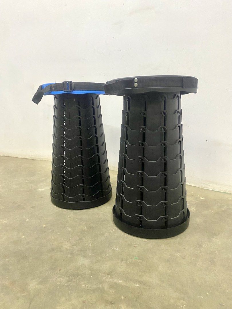 Portable Folding Stool - Blue and Black (Category: Chairs) located in Santa Rosa. Submitted by annie_annie83 (Listing ID 1436741143, Image 3). Description: - Two portable folding stools available - One stool has a blue seat, the other has a black seat - Both stools are black - Features a unique accordion-style design - Includes a handle for easy carrying - Ideal for camping, fishing, and other outdoor activities.