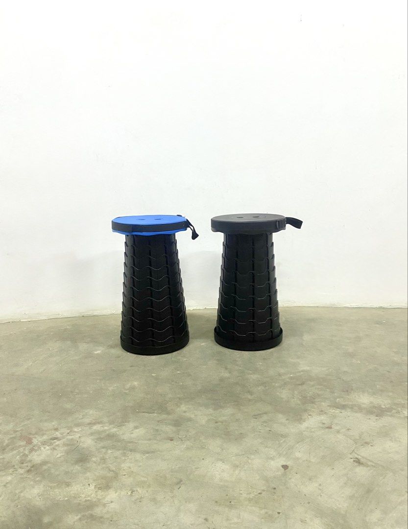 Portable Folding Stool - Blue and Black (Category: Chairs) located in Santa Rosa. Submitted by annie_annie83 (Listing ID 1436741143, Image 1). Description: - Two portable folding stools available - One stool has a blue seat, the other has a black seat - Both stools are black - Features a unique accordion-style design - Includes a handle for easy carrying - Ideal for camping, fishing, and other outdoor activities.