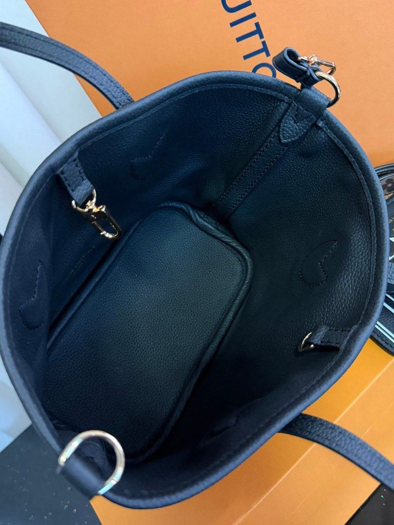 Preloved Lv Mini Reversible Tote Bag with Pouch (Category: Luxury Bags & Wallets) located in Manila. Submitted by bagsandshoesmanymore (Listing ID 1436825714, Image 3). Description: - Authentic Louis Vuitton Mini Tote Bag - Iconic Monogram Canvas -Microchip Scannable - Detachable black shoulder strap - Matching pouch included - Black leather interior -Good condition - Gold-tone hardware - Comes with original box - Classic design, perfect for ever