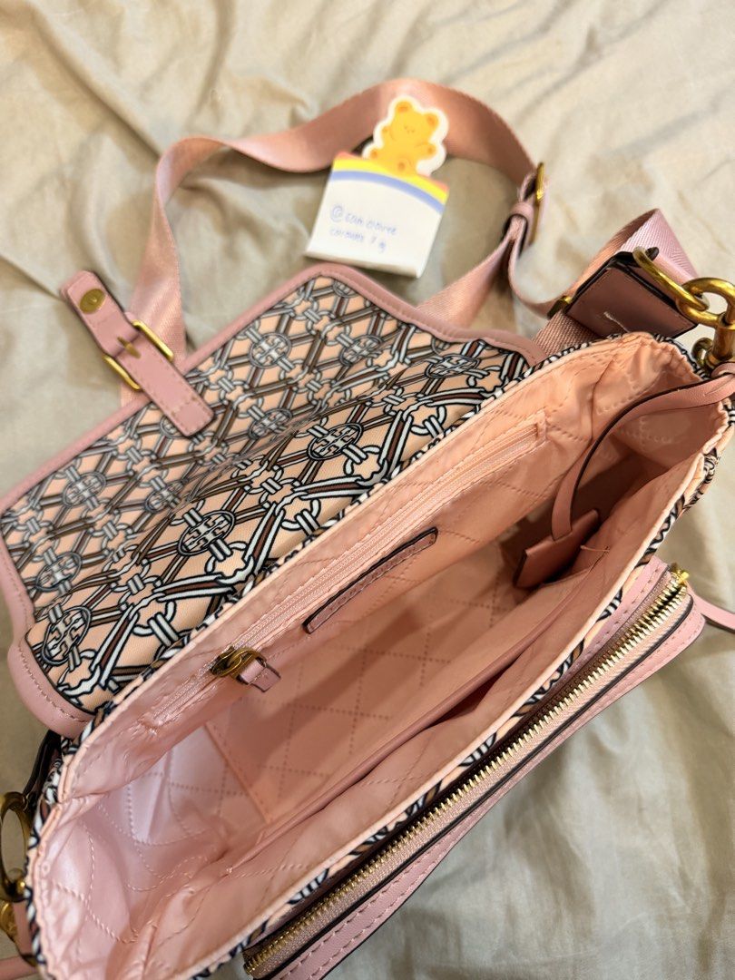 PRELOVED Tory Burch Crossbody Bag (Category: Luxury Bags & Wallets) located in Manila. Submitted by sam.claree (Listing ID 1436817404, Image 3). Description: PRELOVED Tory Burch Piper Printed Nylon Crossbody bag in a pink medallion pattern - used for a few times - what you see is what you get! - nylon material & gold hardware Mop: - bank transfer (maribank or bdo) - ewallet (gcash or gotyme) - meetup shipment: - lalamove sdd or meetup if within m