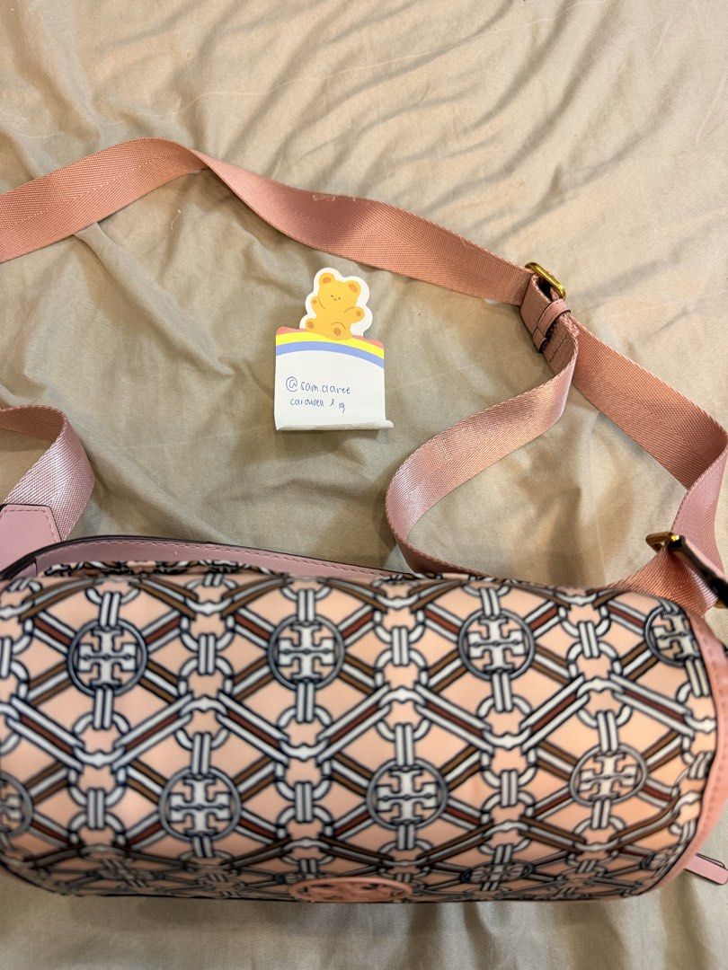 PRELOVED Tory Burch Crossbody Bag (Category: Luxury Bags & Wallets) located in Manila. Submitted by sam.claree (Listing ID 1436817404, Image 2). Description: PRELOVED Tory Burch Piper Printed Nylon Crossbody bag in a pink medallion pattern - used for a few times - what you see is what you get! - nylon material & gold hardware Mop: - bank transfer (maribank or bdo) - ewallet (gcash or gotyme) - meetup shipment: - lalamove sdd or meetup if within m