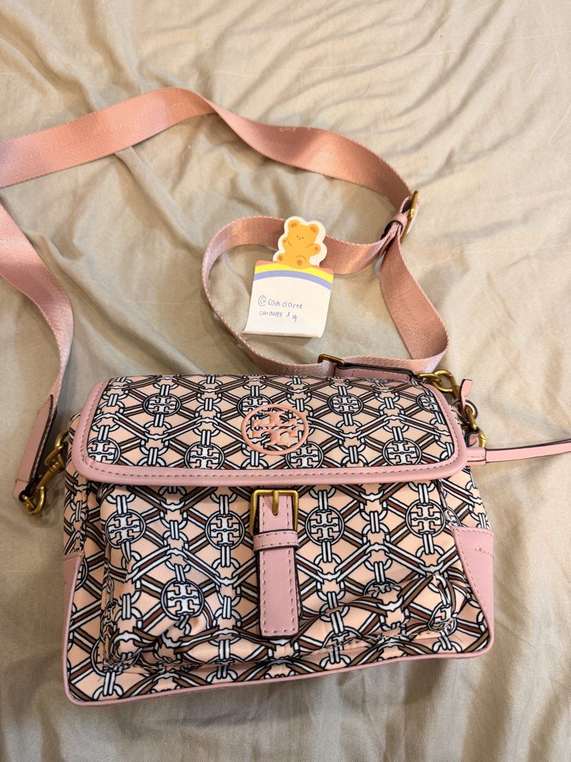 PRELOVED Tory Burch Crossbody Bag (Category: Luxury Bags & Wallets) located in Manila. Submitted by sam.claree (Listing ID 1436817404, Image 1). Description: PRELOVED Tory Burch Piper Printed Nylon Crossbody bag in a pink medallion pattern - used for a few times - what you see is what you get! - nylon material & gold hardware Mop: - bank transfer (maribank or bdo) - ewallet (gcash or gotyme) - meetup shipment: - lalamove sdd or meetup if within m