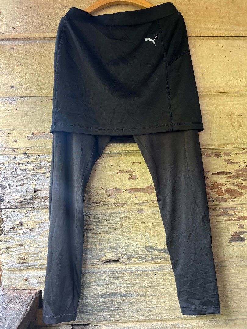 Puma Skirted Leggings - Black - Size M (Category: Activewear) located in Baroy. Submitted by laudecarlfe24 (Listing ID 1436741934, Image 1). Description: - Puma skirted leggings - Size: M - Features Puma logo - Made of smooth, athletic material - Combines skirt coverage with leggings comfort - Suitable for various activities.