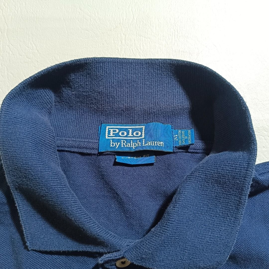 Ralph Lauren Navy Blue Poloshirt (Category: Activewear) located in Baguio. Submitted by freshmarket_2600 (Listing ID 1436663944, Image 3). Description: Brand: Ralph Lauren Tags: Complete Size: Med Dimension: L26W20.5 Condition: Excellent Color rate: 10/10 Color: Navy blue Issue/s: None.